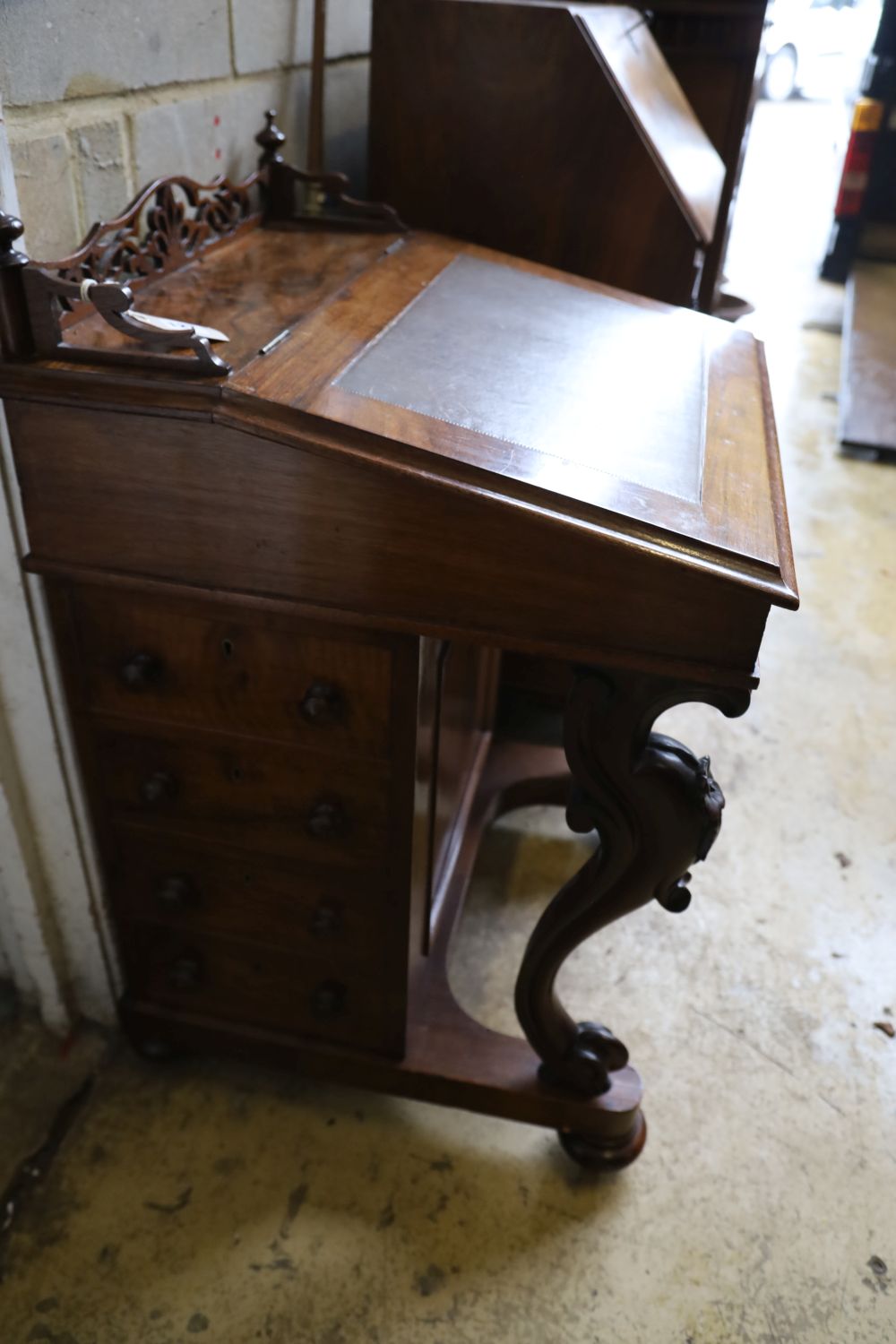 A Victorian figured walnut Davenport, width 56cm, depth 56cm, height 90cm